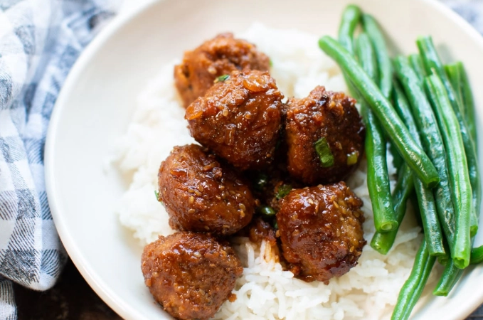 Slow cooker teriyaki meatballs with rice