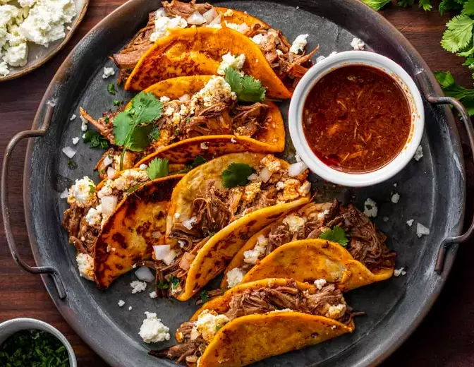 How do you cook beef tacos in a slow cooker?
