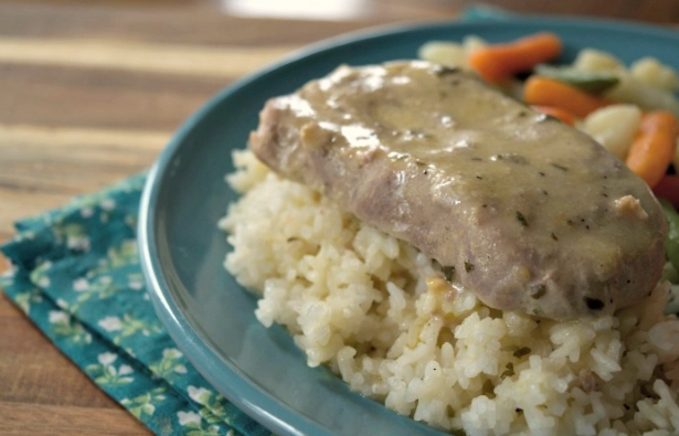 Pork chops and dressing in crock pot with rice