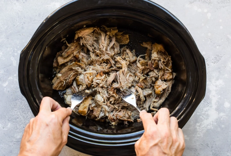 Do I add water to a slow cooker for pulled pork?